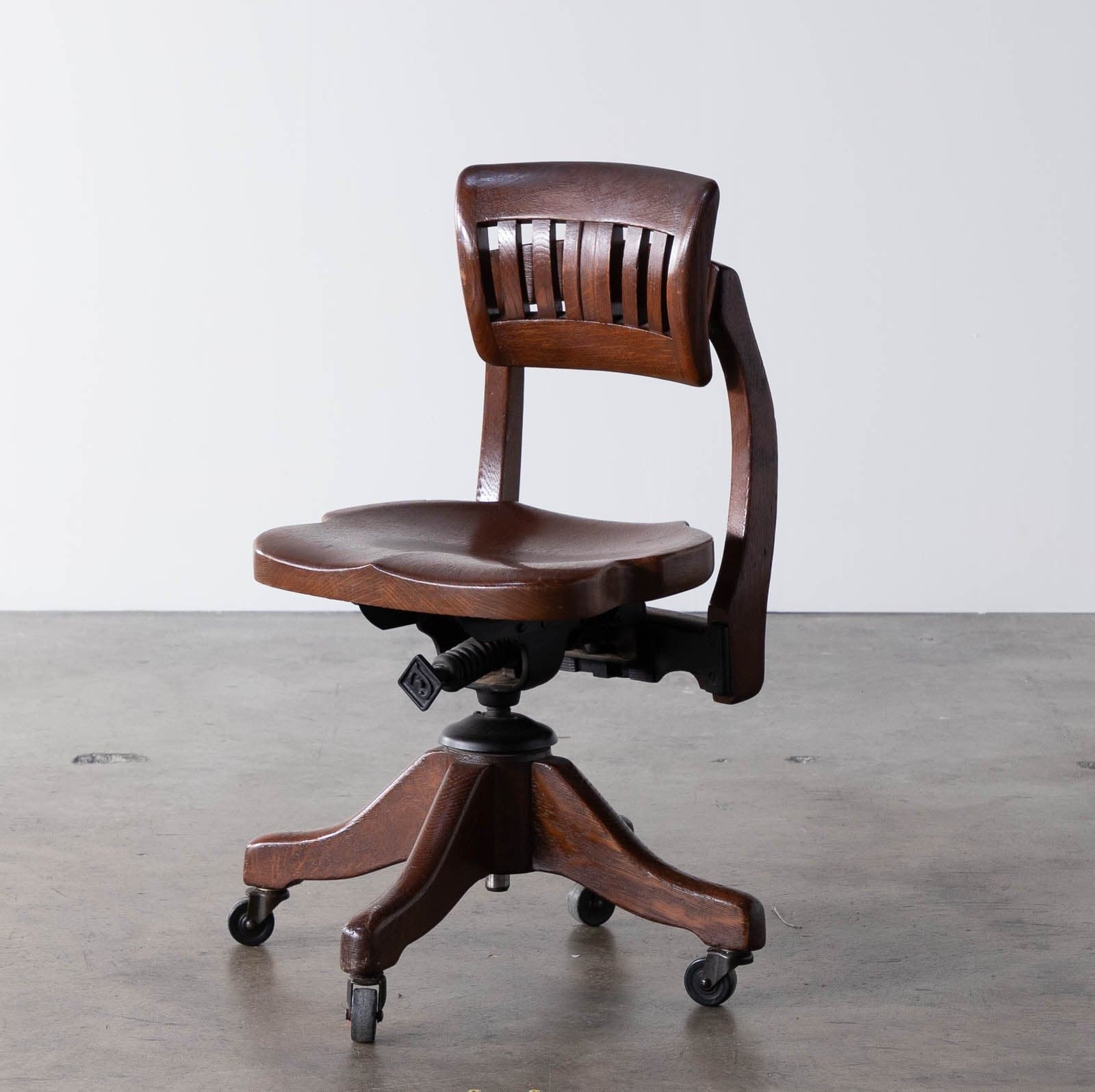 Vintage Oak Rolling Chair with spring-back recline