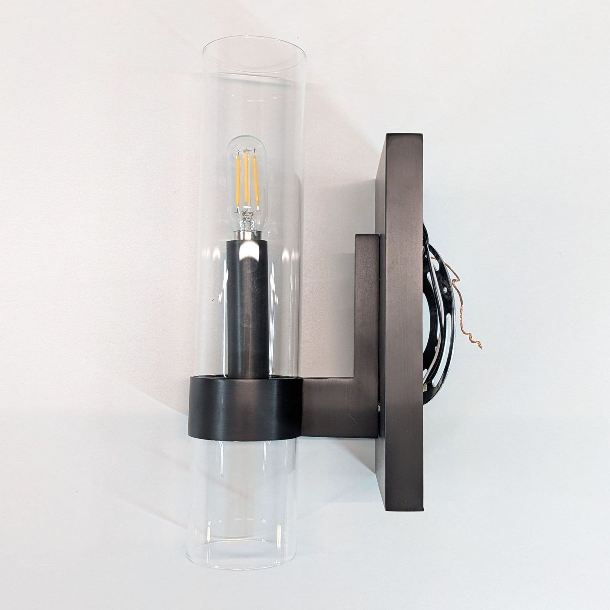 Sleek Modern Wall Sconce with Clear Glass Cylindrical Shade - Thumbnail 4