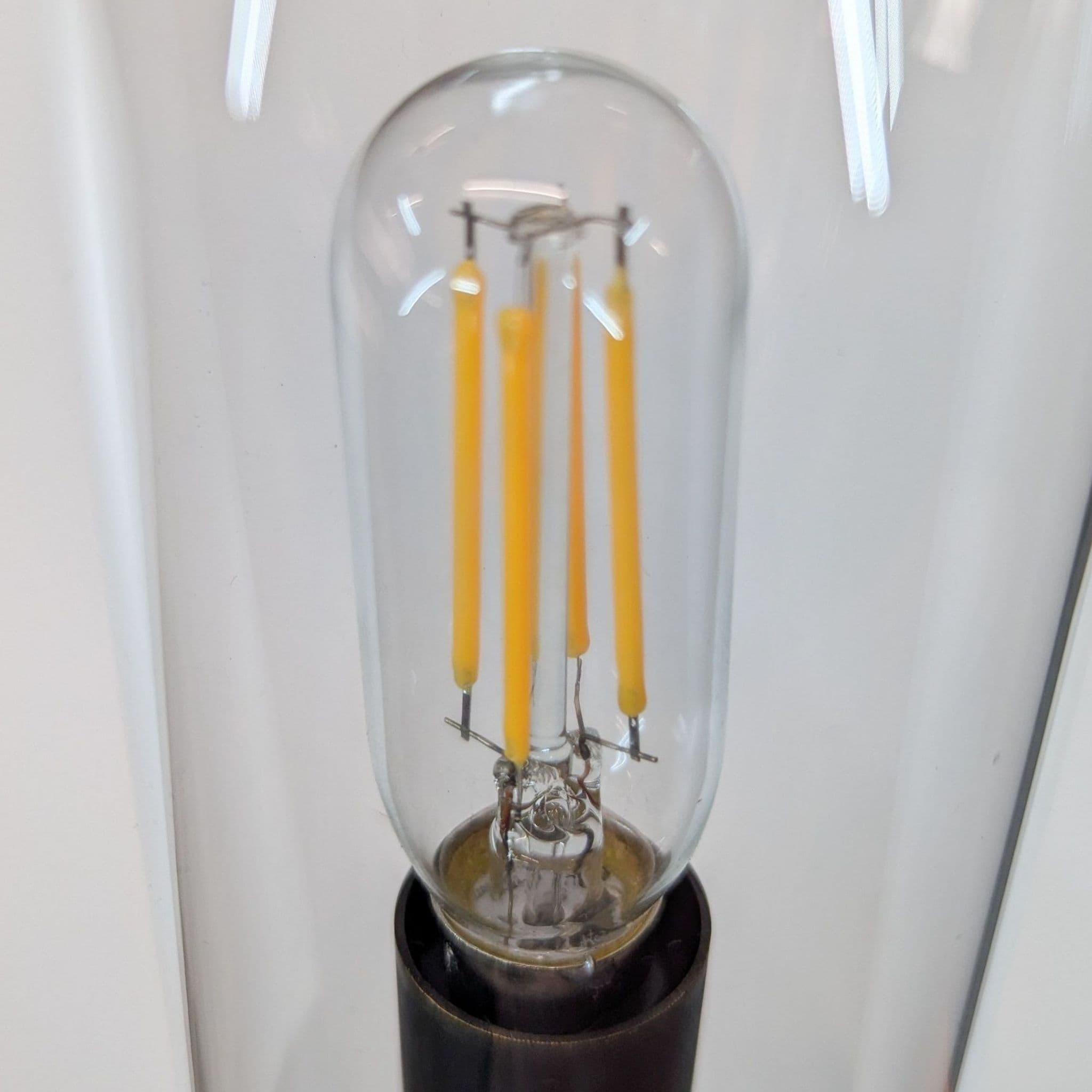 Sleek Modern Wall Sconce with Clear Glass Cylindrical Shade - Thumbnail 3