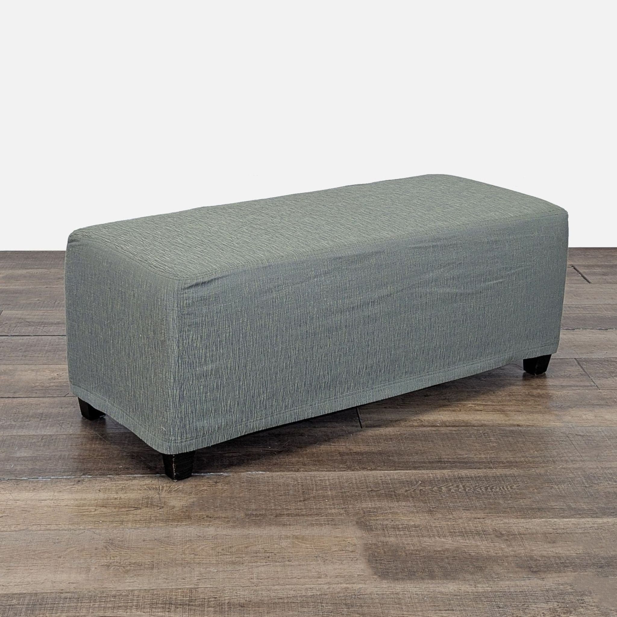 Slip Covered Ottoman on Wood Feet - Thumbnail 2