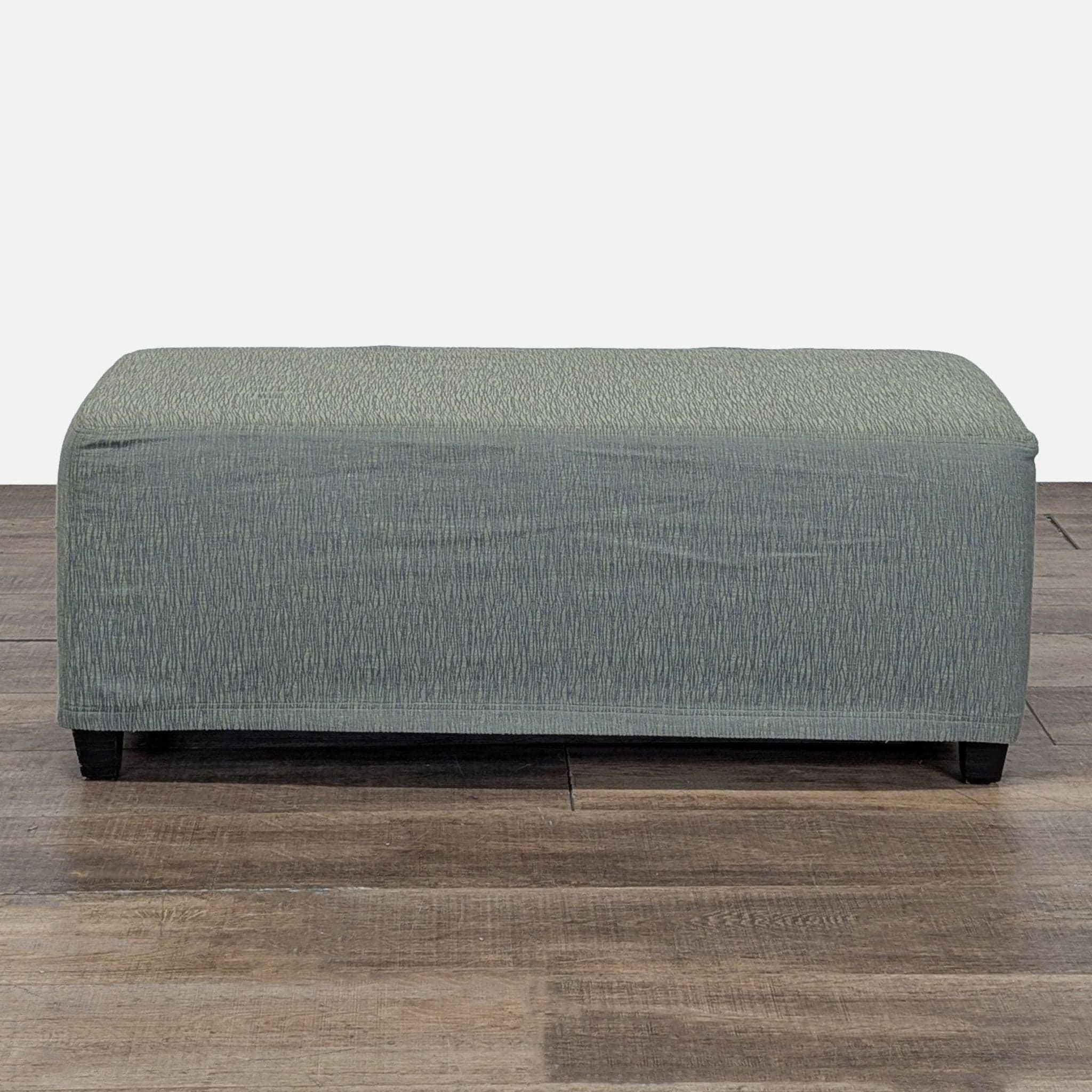 Slip Covered Ottoman on Wood Feet - Thumbnail 6
