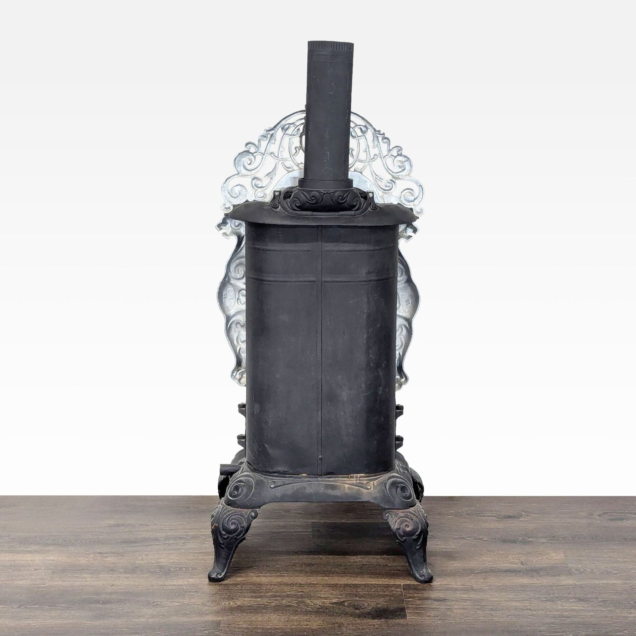 Vintage Iron Parlor Stove with Ornate Details - Thumbnail 2