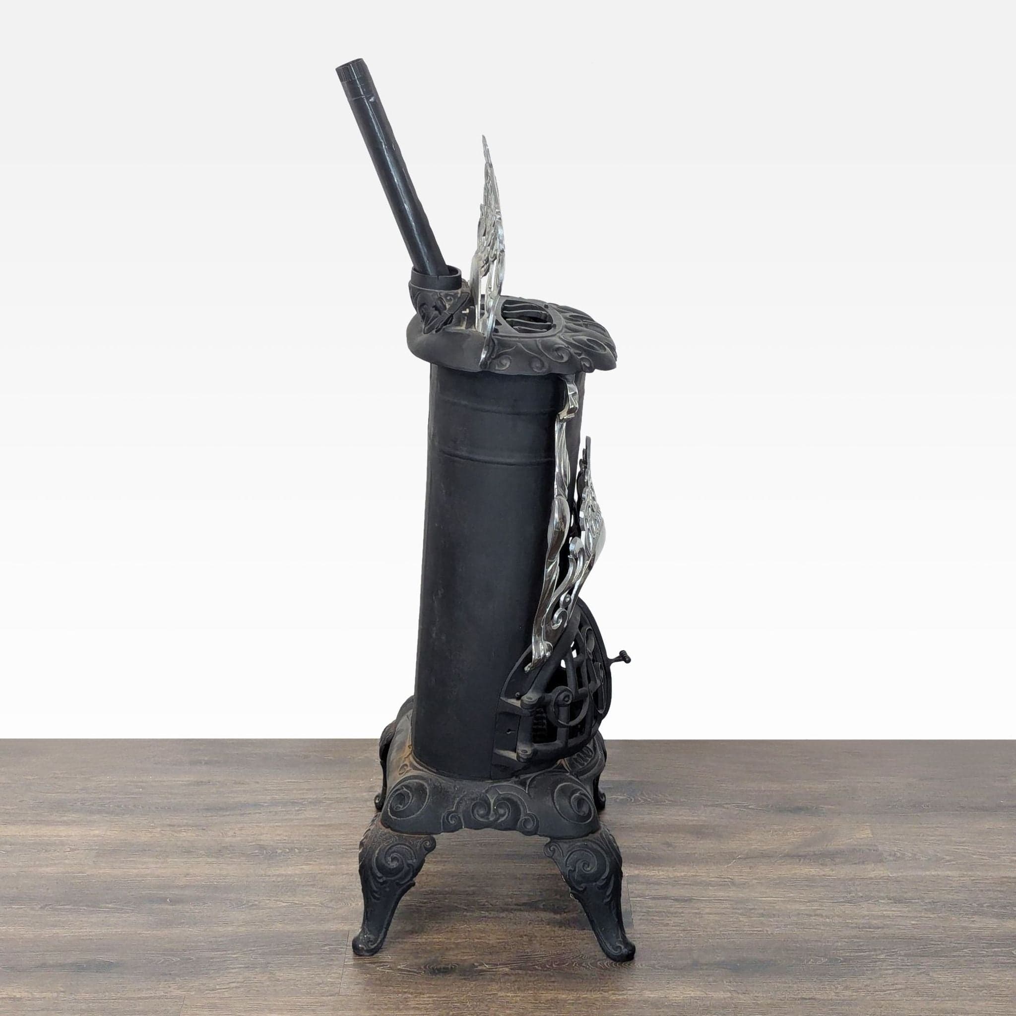 Vintage Iron Parlor Stove with Ornate Details - Thumbnail 10