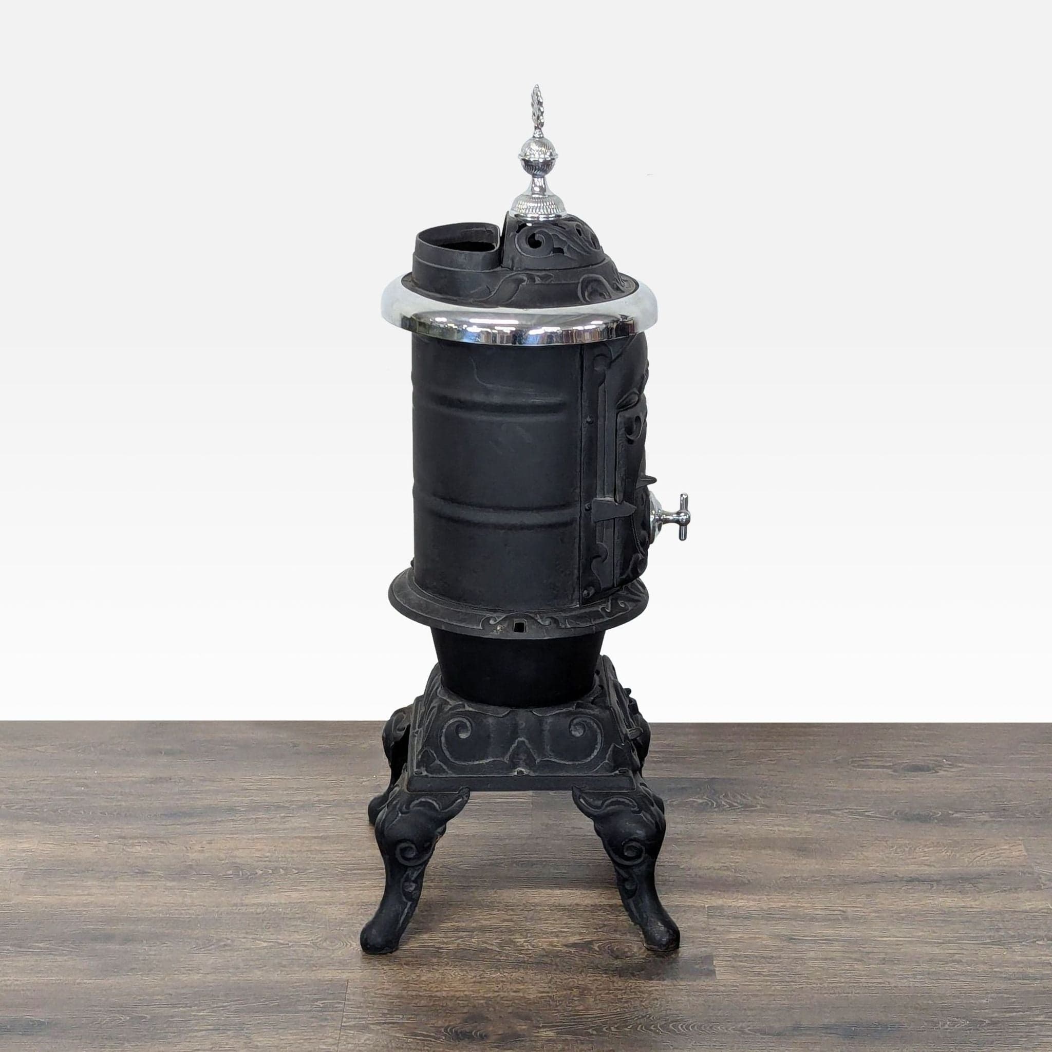Antique Iron Parlor Stove with Decorative Silver Accents - Thumbnail 6