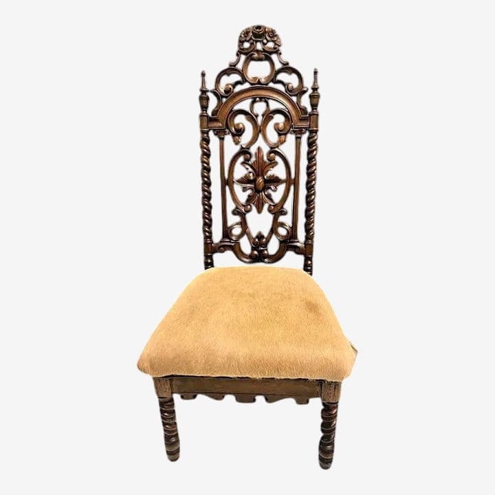 Late 19th Century Carved Rosewood Renaissance Revival Chair With Hair-On Cowhide Seat Upholstery - Image 1