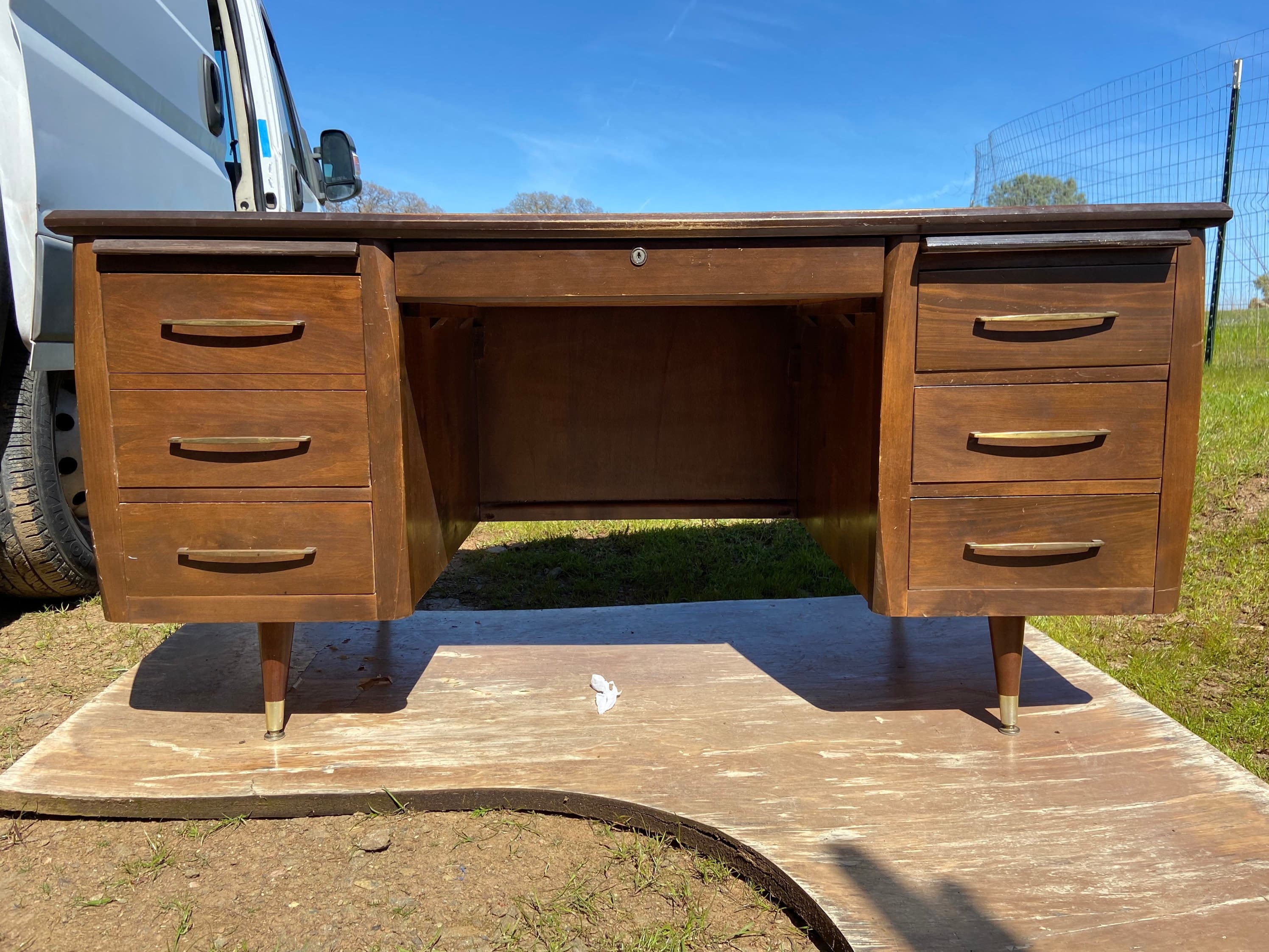 Vintage mid century modern wood veneer executive desk. - Image 1