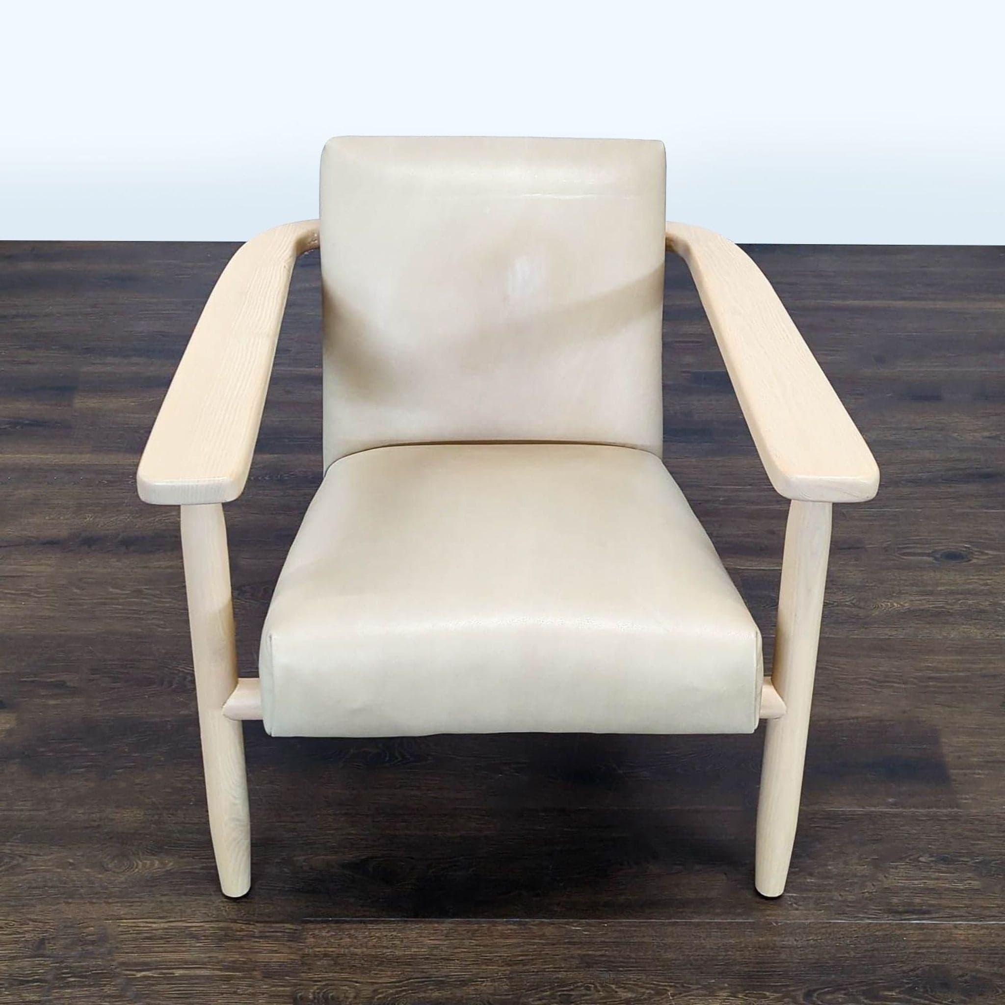 Four Hands Arnett Modern Lounge Chair with Light Wood Frame and Cream Leather Upholstery - Image 1