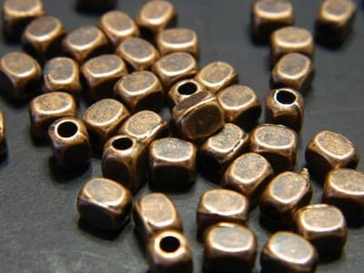 4.5MM Small Copper Rectangular Cuboid Metal Alloy Spacer Beads-Tibetan Style - Image 1