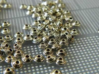 Silver Tibetan Spacer Beads: Flat Donut Design (5mm Diameter) 50 beads - Thumbnail 4