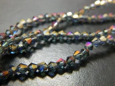 Golden Purple Bicone Beads: 3mm Faceted Glass Strand - Image 1