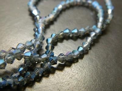 Faceted Glass Beads: Marine Blue 3mm Bicone - Rainbow Finish Strand - Image 1