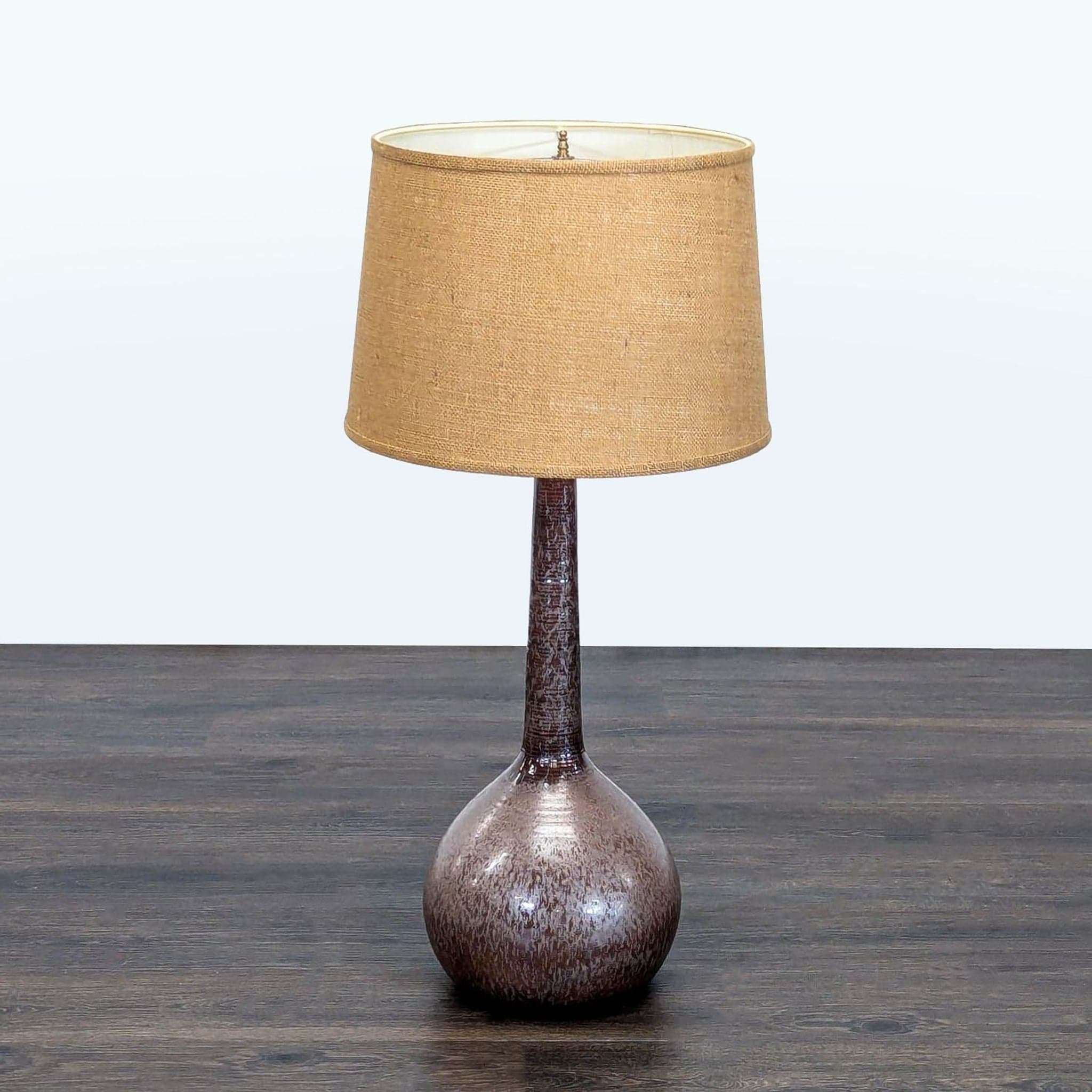Modern Ceramic Table Lamp with Textured Brown Glaze and Fabric Shade - Image 1
