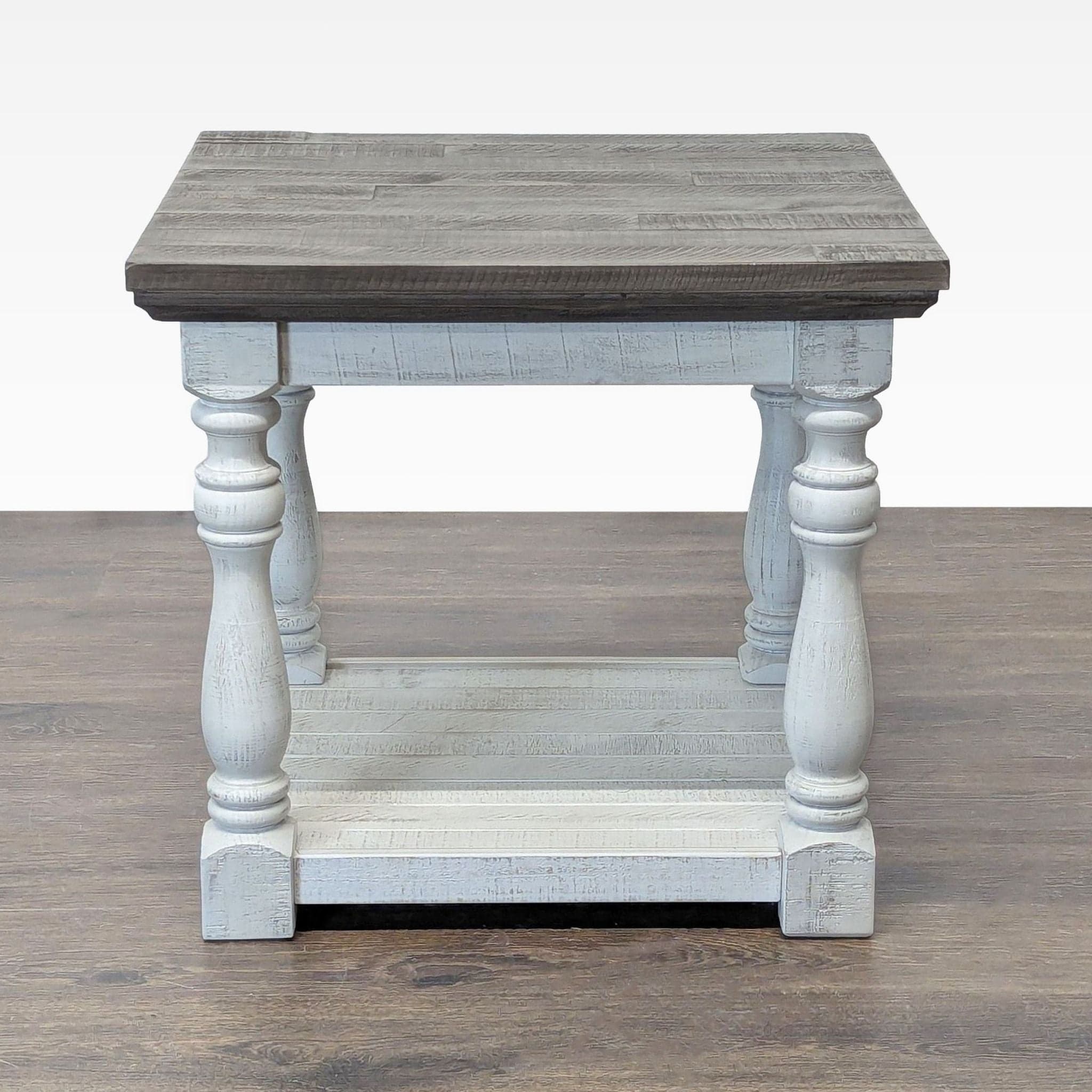 Ashley Furniture Havalance Rectangular End Table - Image 1