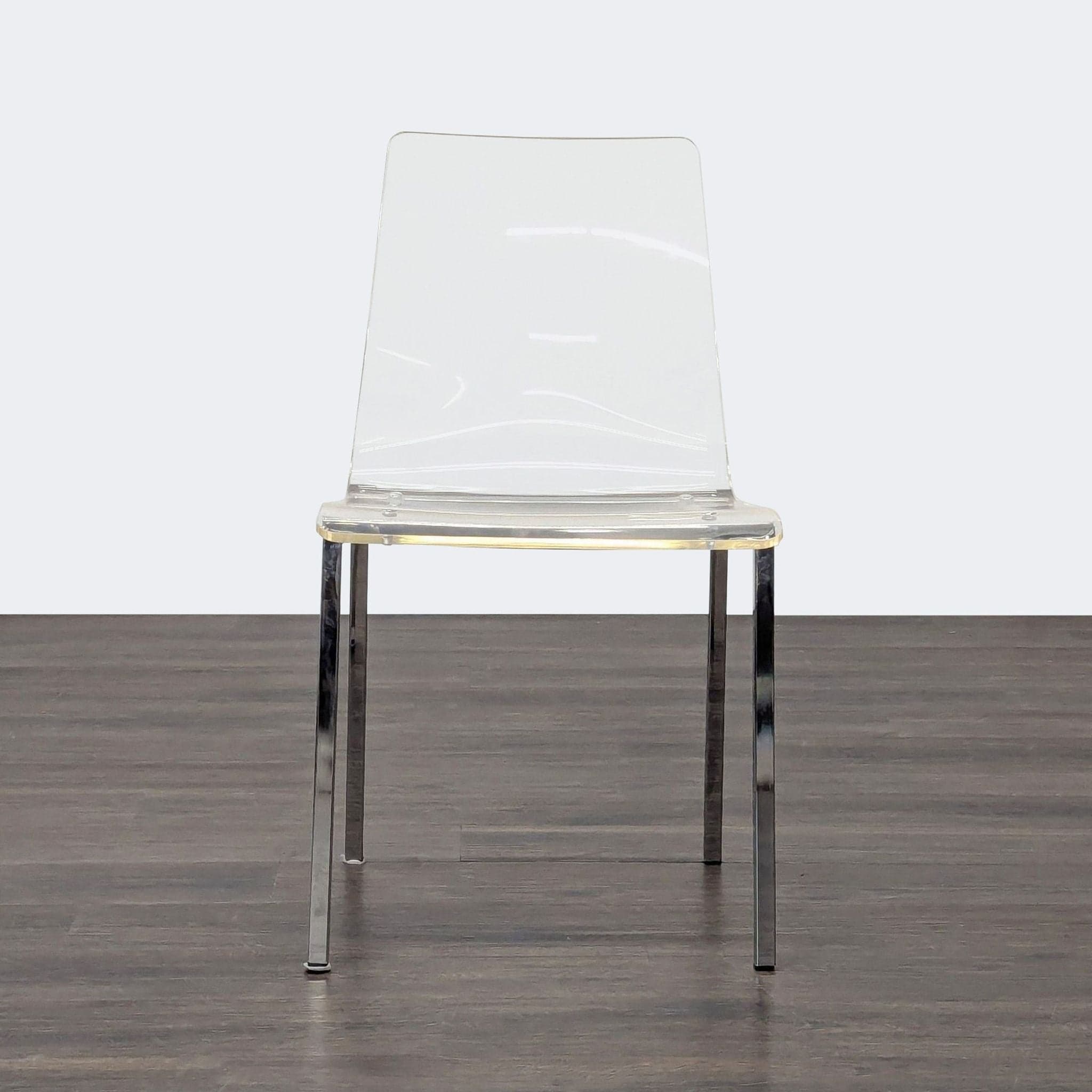 Clear Plastic Dining Chair on Metal Base - Image 1