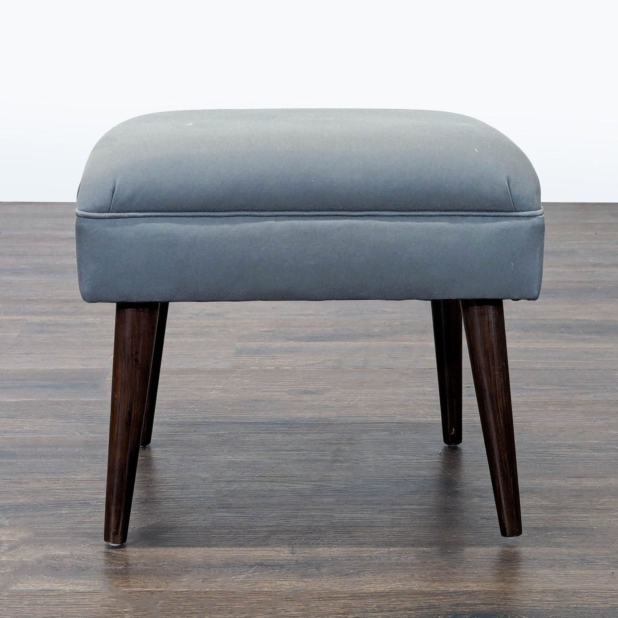 Skyline Furniture Upholstered Footstool on Wood Legs - Image 1