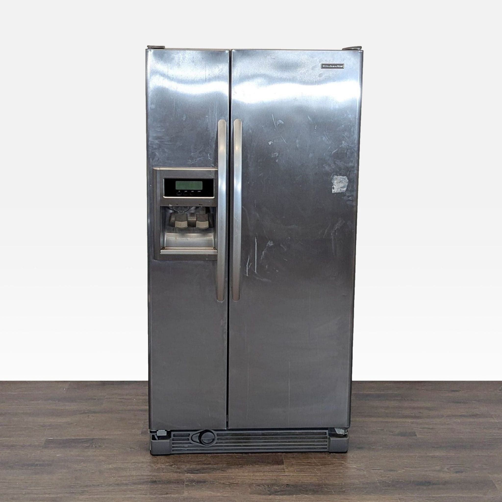 KitchenAid Side-by-Side Stainless Steel Refrigerator with Ice & Water Dispenser - Image 1