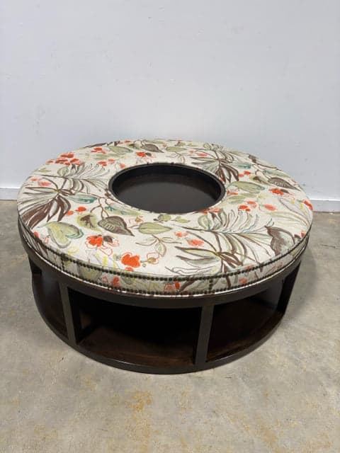 Custom Round Upholstered Ottoman With Wooden Base, Tray And Nailheads - Image 1