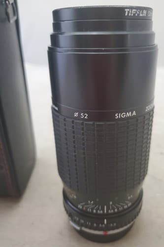 Sigma USA Camera Lens 75 - 210mm Zoom Tiffen Filter 52mm Sky 1-A - Image 1