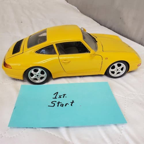 Burago 1993 Porsche 911 Carrera Car Yellow - Image 1