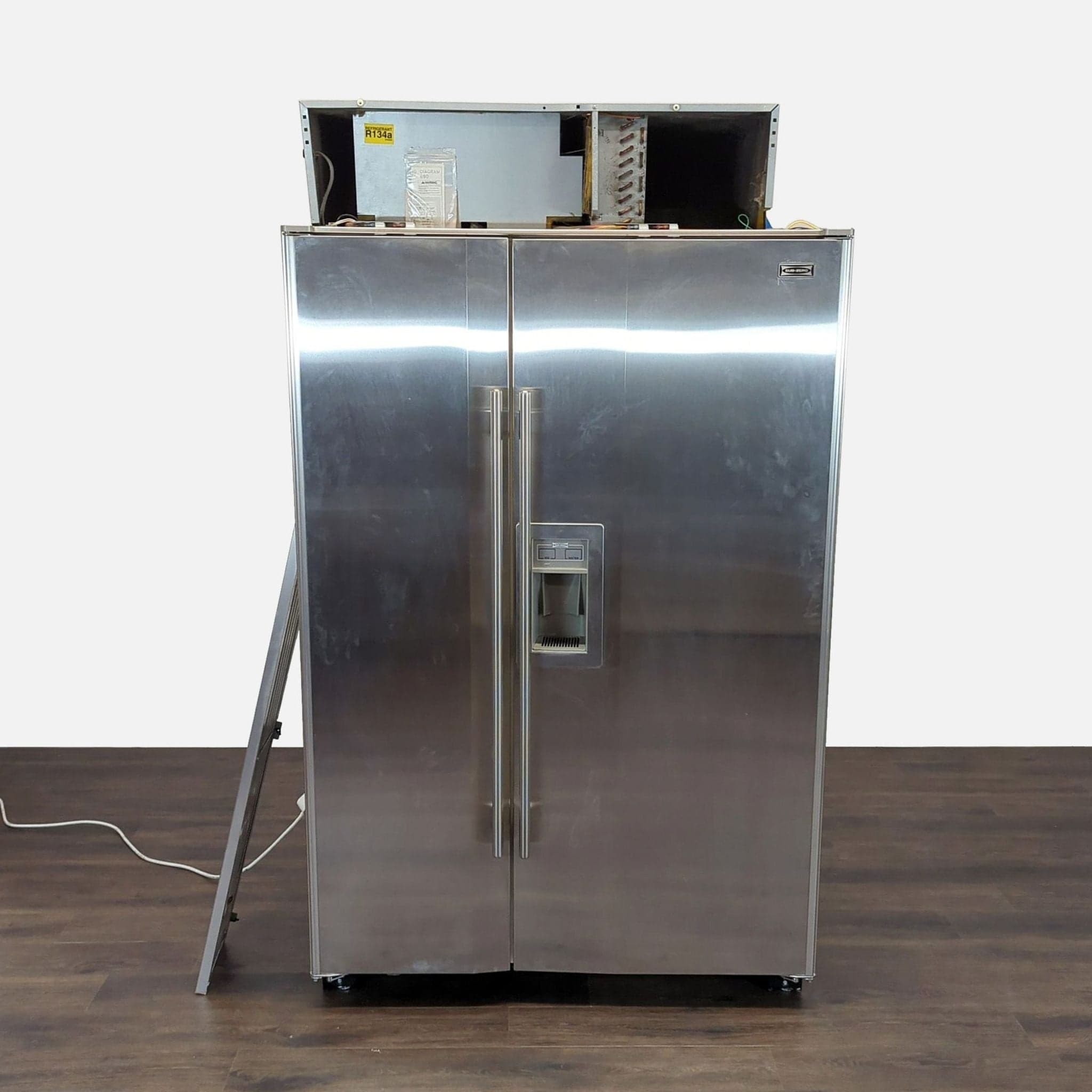 Sub-Zero Stainless Steel Side-by-Side Refrigerator with Water and Ice Dispenser - Image 1