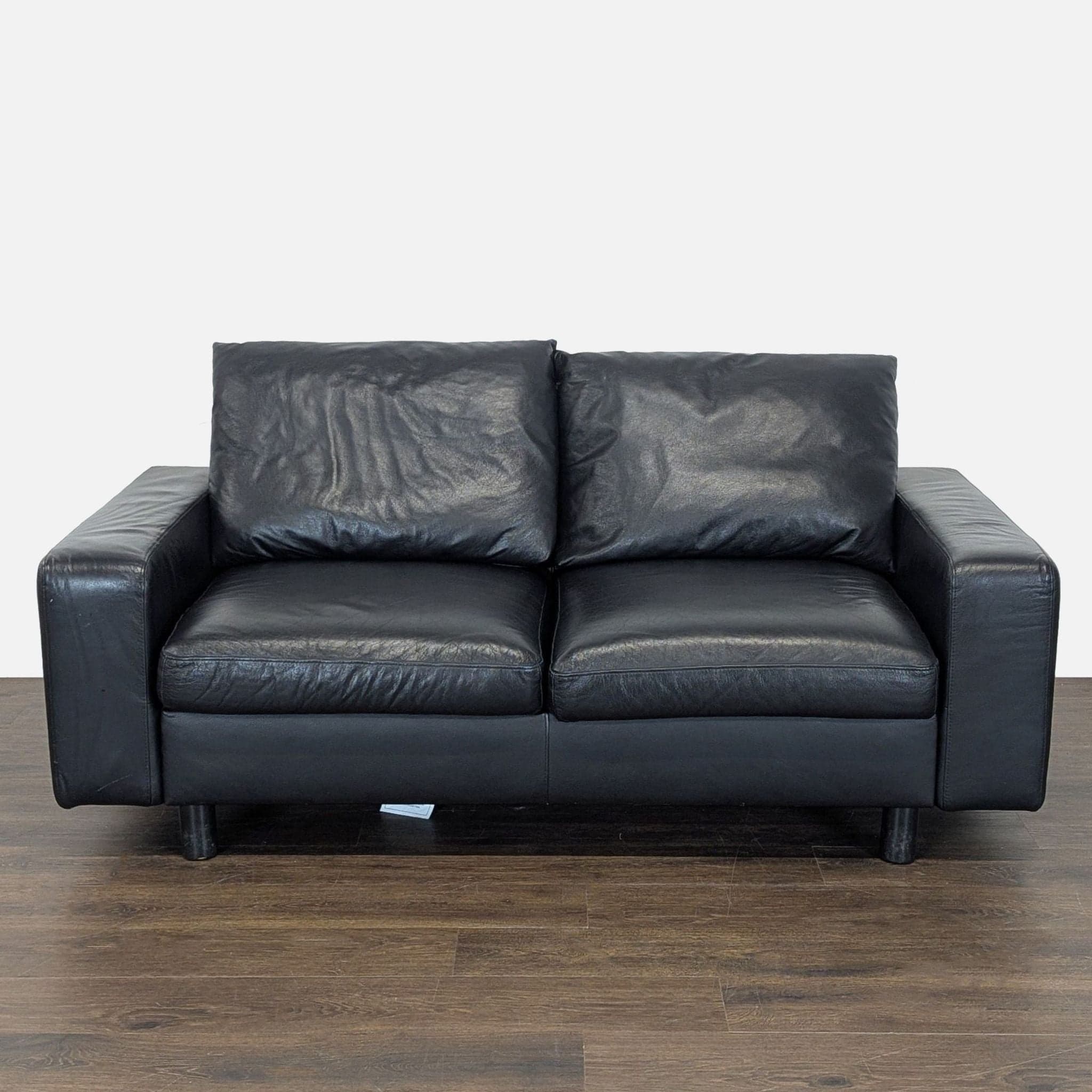 Ekornes Batick Stressless Black Leather Loveseat - Modern Comfort - Image 1
