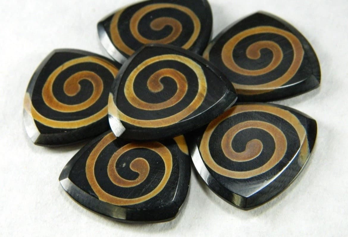 2 Swirl Buffalo Horn Guitar Picks - Image 1