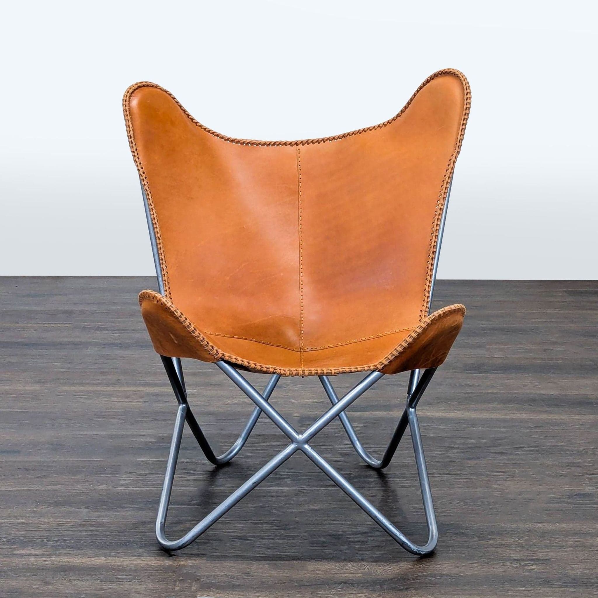 Modern Leather Butterfly Lounge Chair with Metal Frame - Image 1