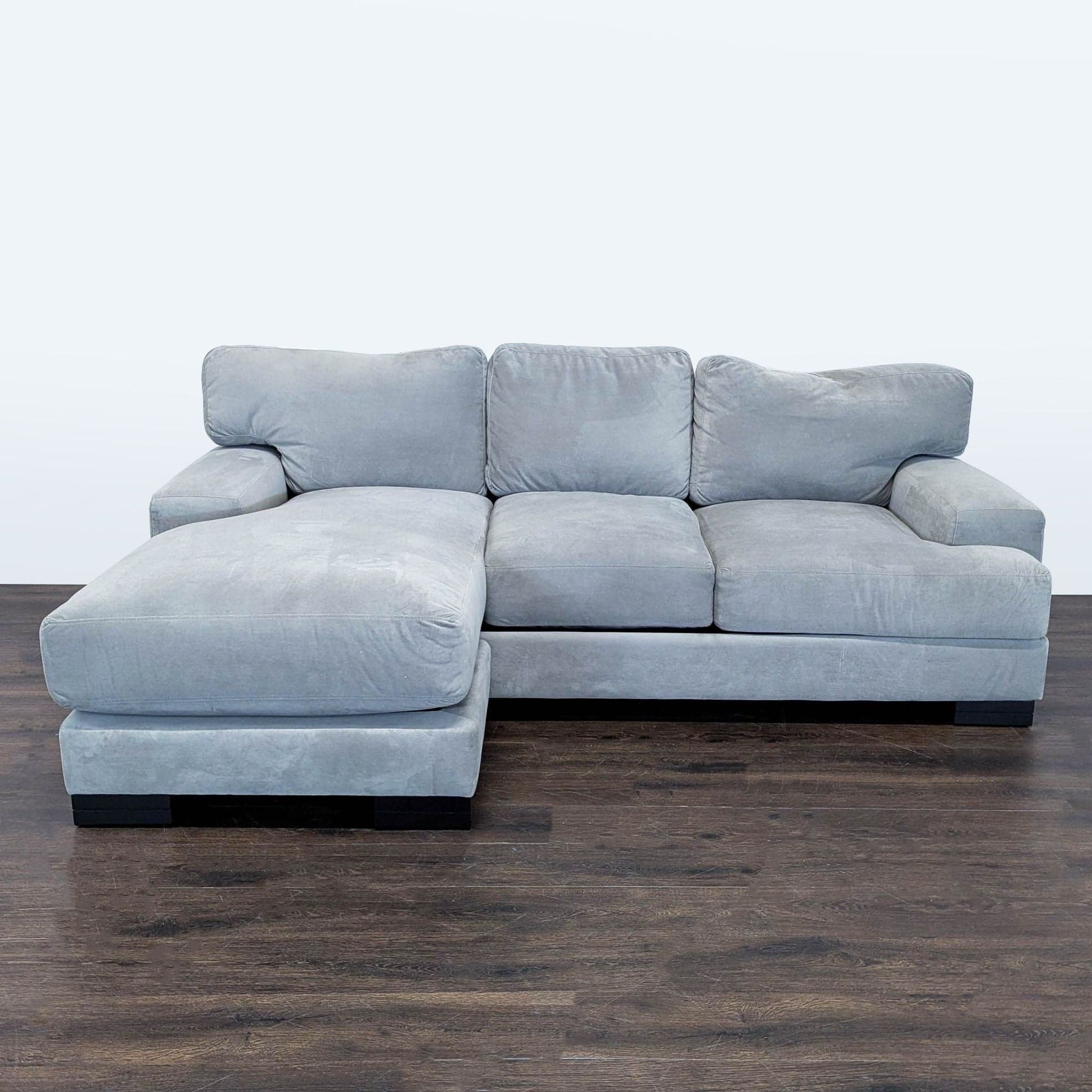 Lving Spaces Gray Sectional Sofa with Chaise - Modern and Comfortable - Image 1