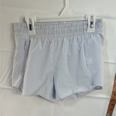 Athleta Girl Light Blue Athletic Shorts Size M Zip Pocket Breathable Polyester