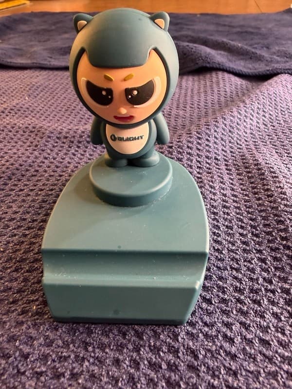 Olight Omascot Mascot Cell Phone Holder Statue Sealed in Plastic Swag Rare - Image 1