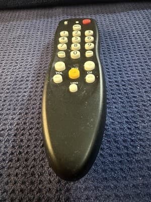 Funai NC003UD TV Remote Control Black w/ Yellow Mute AA Batteries Included - Image 1