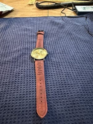 Lord Ganesha Engraved Gold Dial Quartz Wristwatch Burgundy Strap SR626 Battery - Image 1