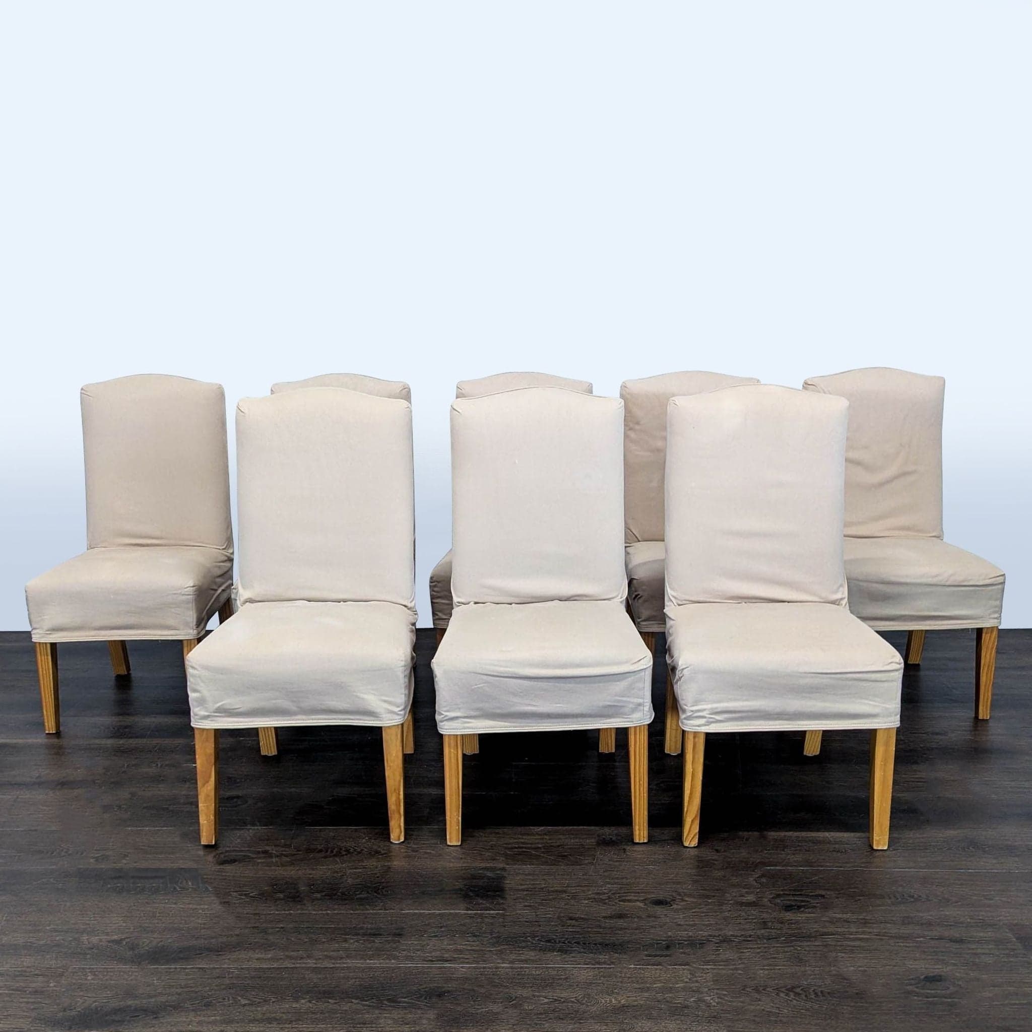 Eight Slip-Covered Dining Chairs - Image 1