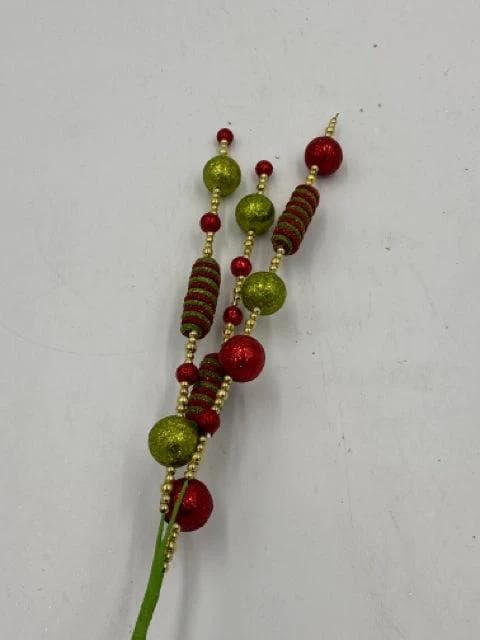 Green Red and Gold Sticks with Balls and Green and Red Swirl - Image 1