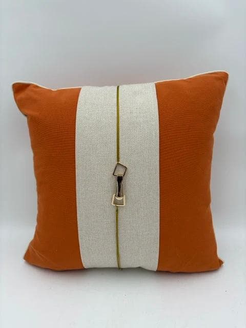 Orange And Cream Pillow With Gold Metal Accents - Image 1