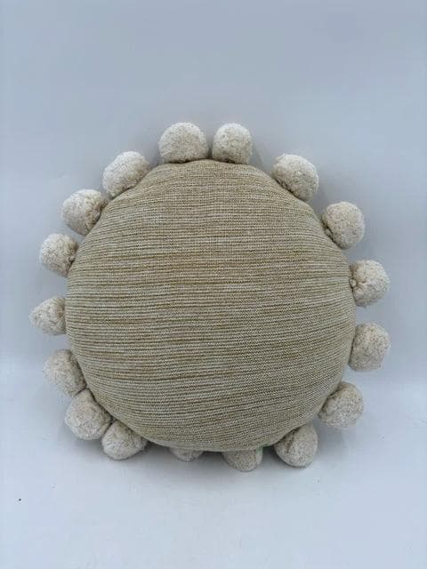 Round Gold Pillow with Pom Poms - Image 1