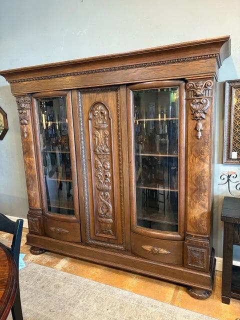 Antique Dark Wood Carved Cabinet With Three Doors And Glass Front - Image 1