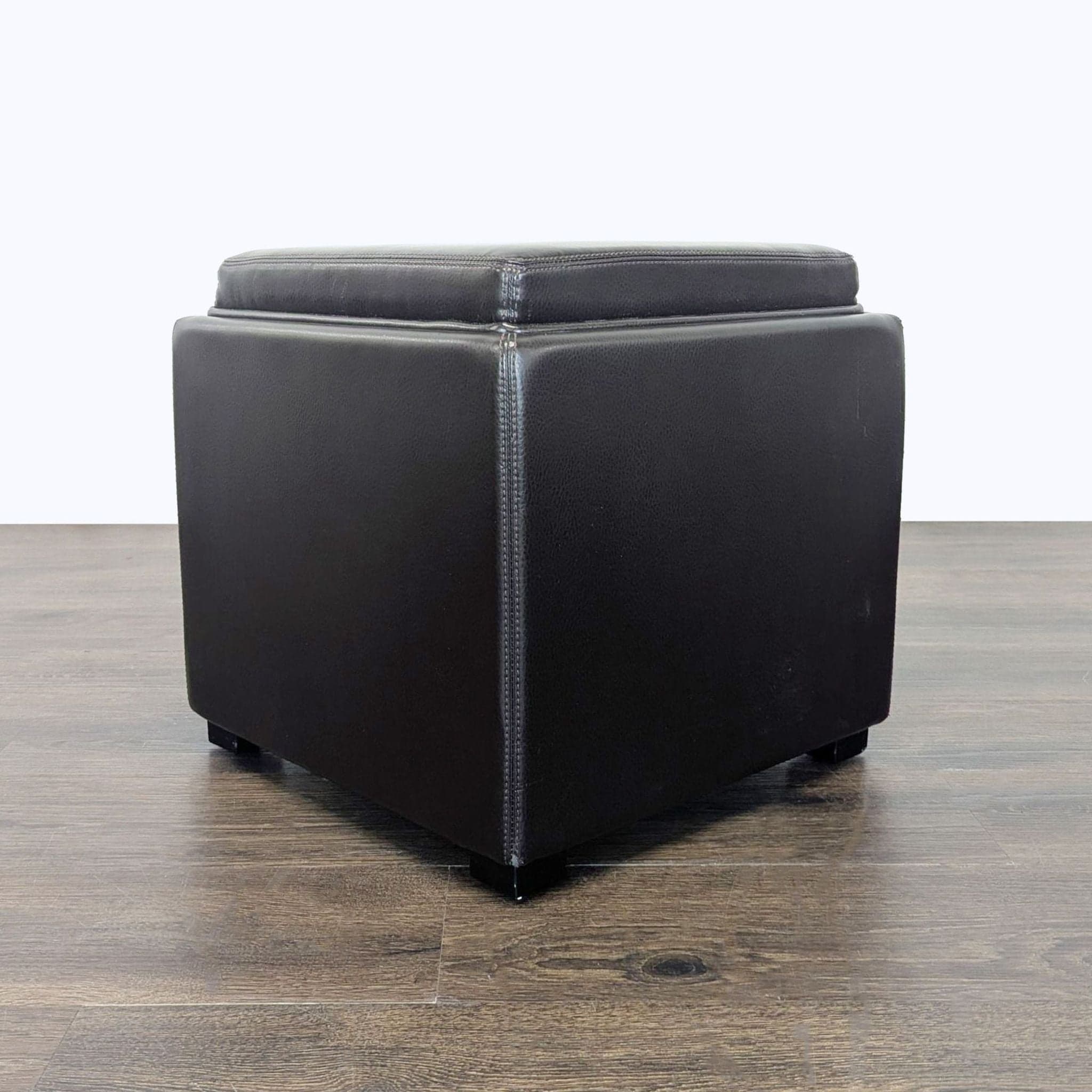Crate & Barrel Stow Storage Ottoman - Image 1