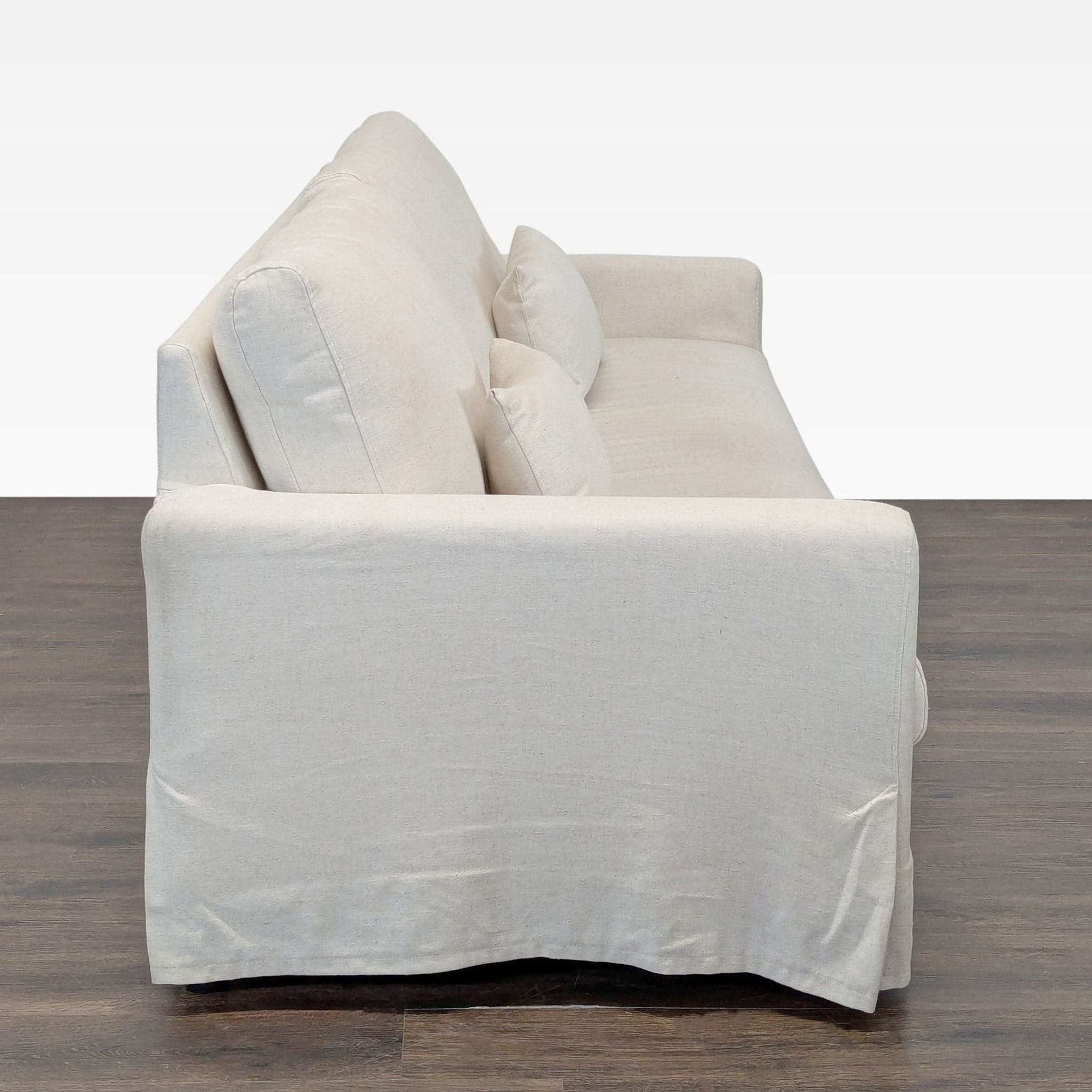 IKEA Hyltarp 3-Seat Sofa in Light Beige with Removable Slipcover - Thumbnail 5