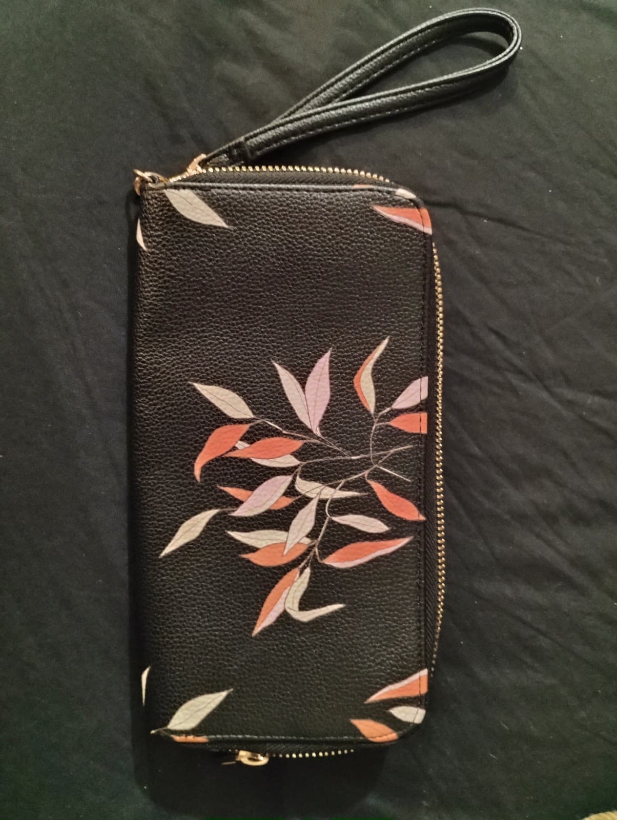 A New Day black clutch/ wallet.