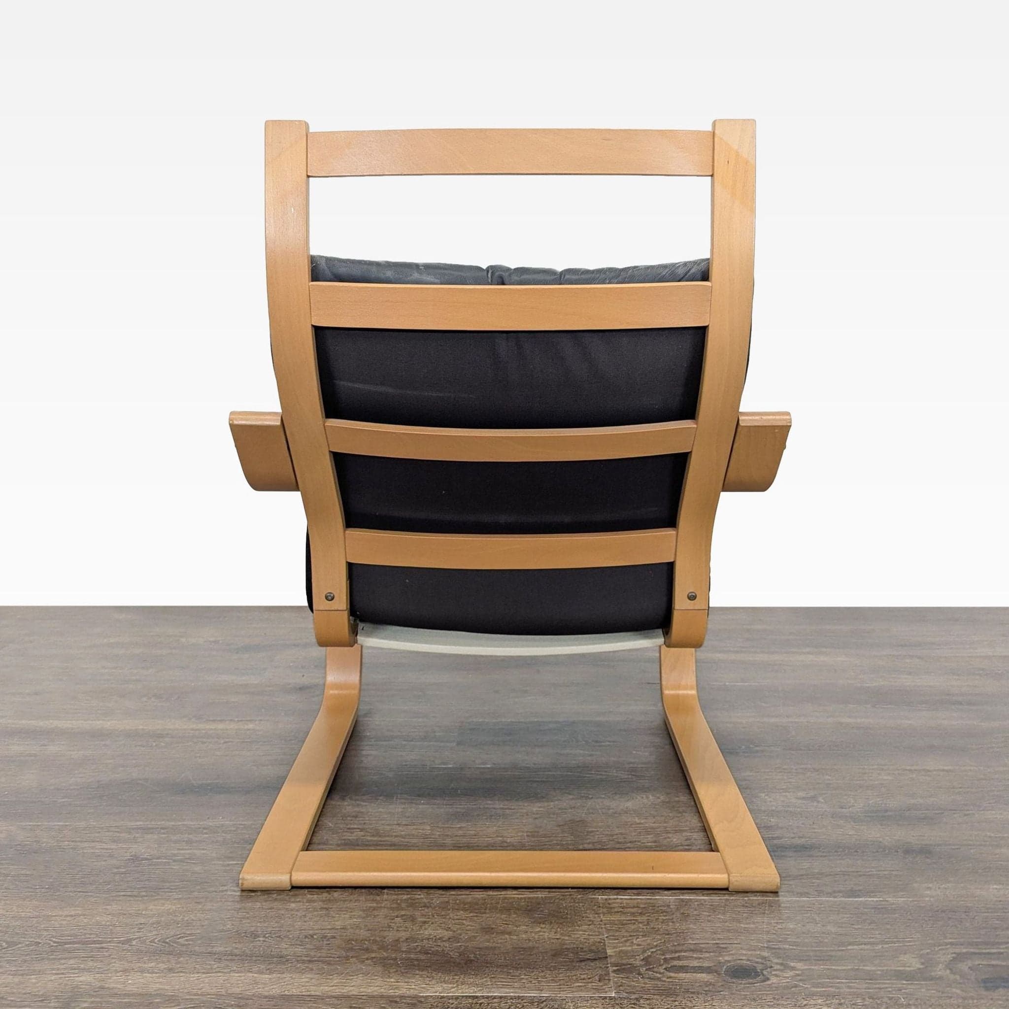 Modern Lounge Chair with Wooden Frame and Black Leather Cushion - Thumbnail 3