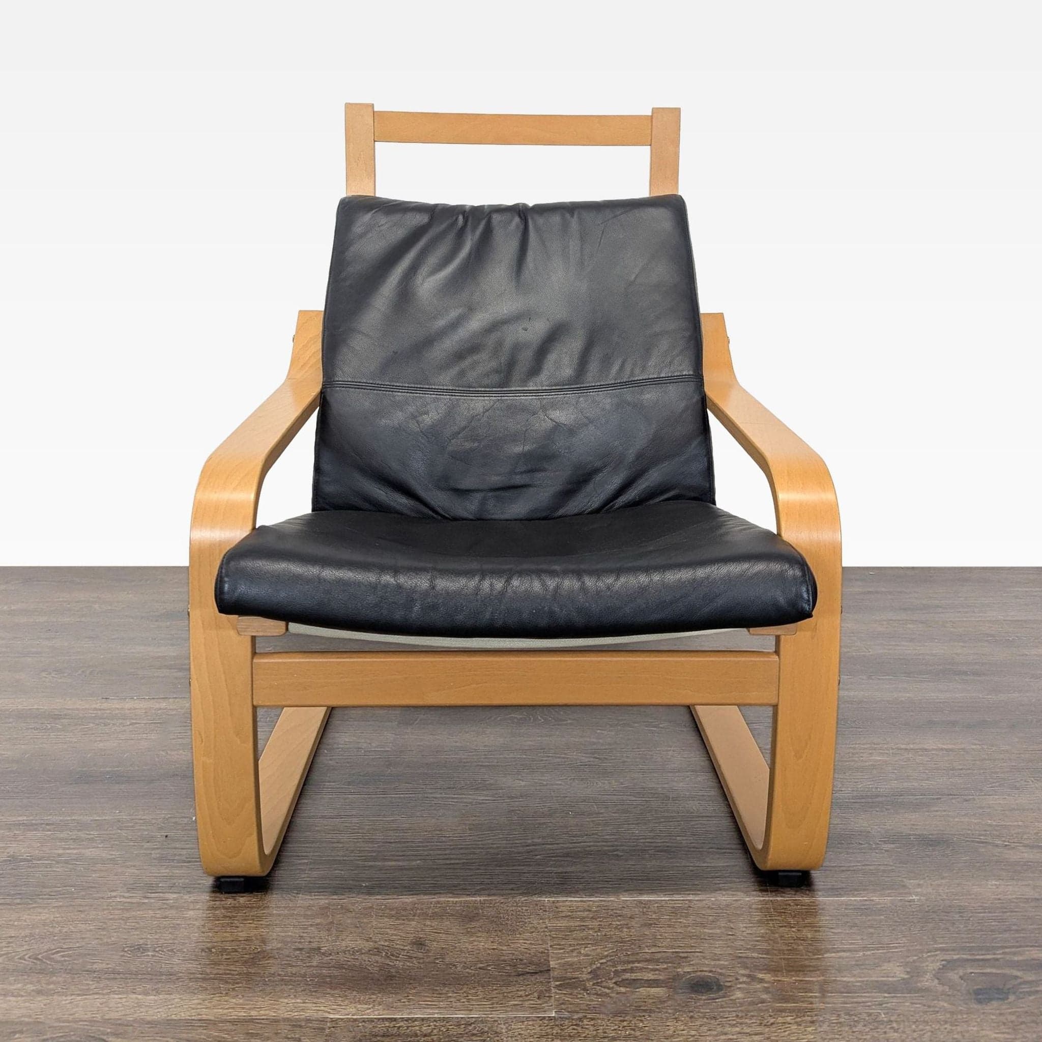 Modern Lounge Chair with Wooden Frame and Black Leather Cushion - Thumbnail 2