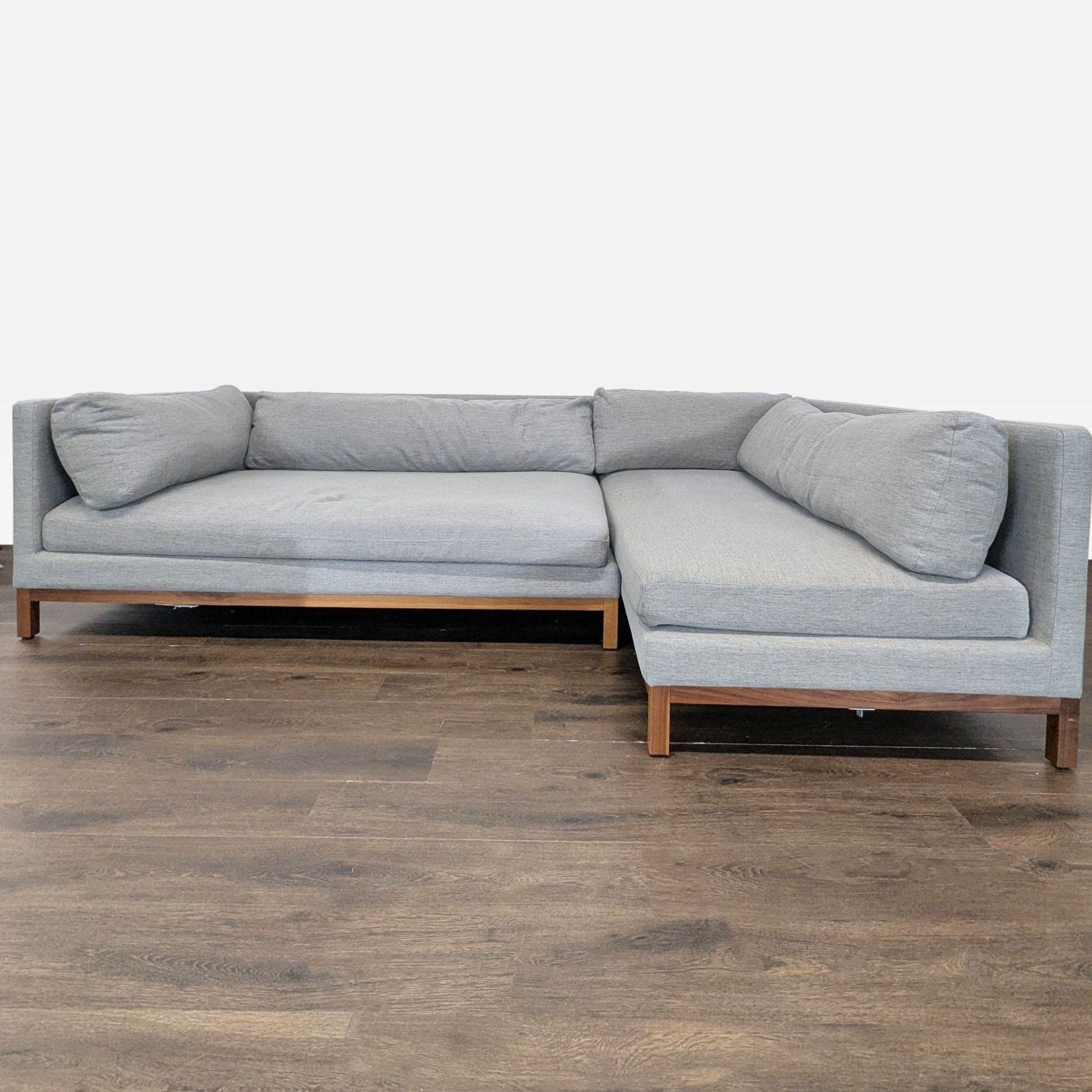 Interior Define Jasper Grey Sectional Sofa with Walnut Wood Base - Image 1