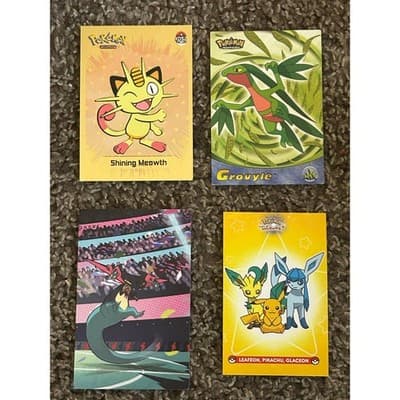 Lot of 4 Pokemon Collectables: Art Cards, Sticker, and Collaborations - Image 1