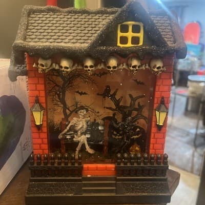 Lounging Skeleton With Black Cat Lighted Spinning Water Lantern - Image 1