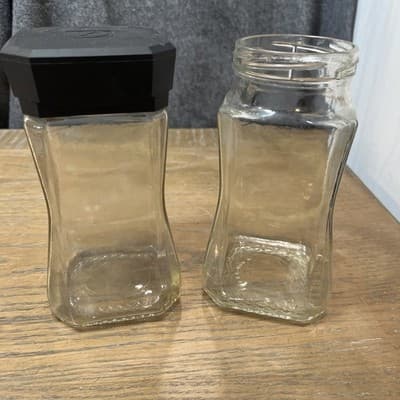Set Of Two Clear Glass jars with Black Plastic lid On One 7.25” Height - Thumbnail 3