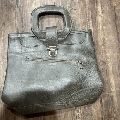 Women’s Used Leather Handbag Grey With Silver Accents And Lock Snap Close - Image 1