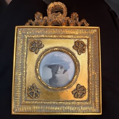 Vingtage Gold Glass Frame Of Black And White Photo And Detailed Design On Frame - Image 1