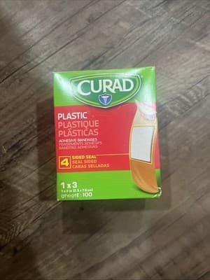 Curad Plastic Adhesive Bandages, Bandage Size is 1" x 3", 100 Count - Image 1