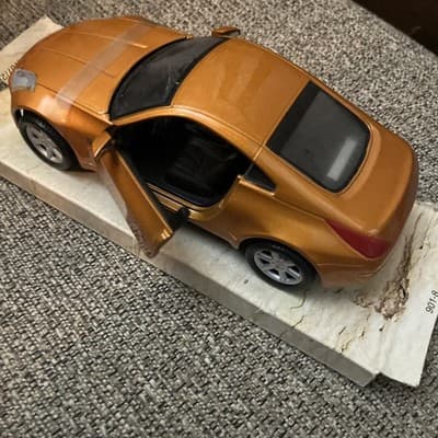 NEW NISSAN 350Z MAISTO 1/24 ORANGE / GOLD CAR w OPENING HOOD & DOORS, NO BOX - Thumbnail 4